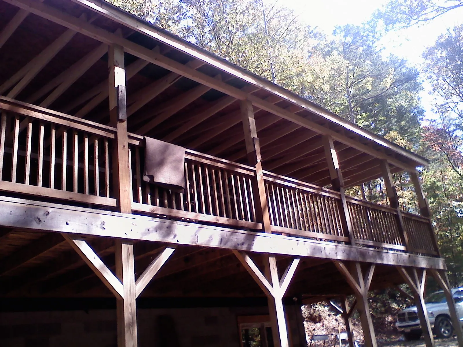 Timber framing under a new elevated porch and deck — Roof Leak Repair in Trego by Roofing Brothers